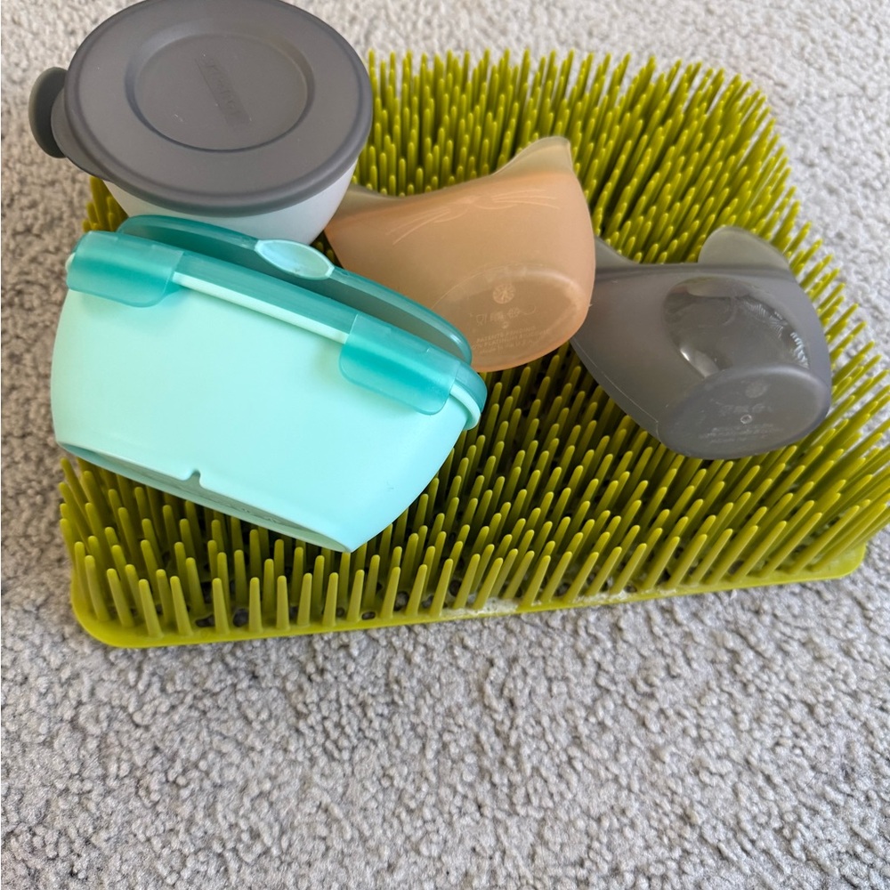 Boon drying grass and baby feeding gear